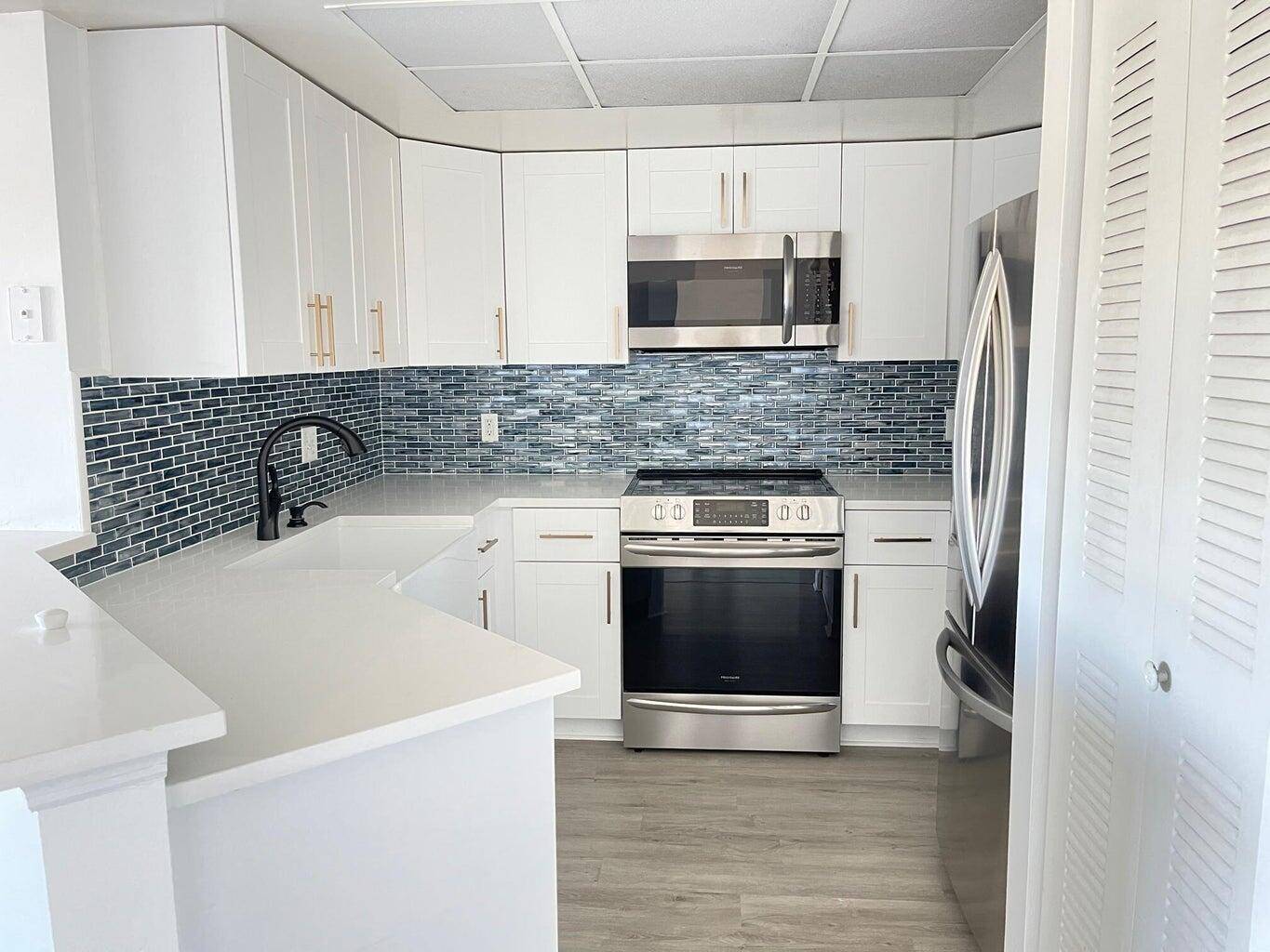 Welcome home to your updated, light bright 2 bedroom 2 bathroom, 3rd floor condo with covered balcony overlooking amazing lake garden.