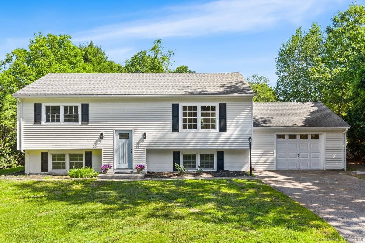 Don't miss this chance to own a stunning, oversized raised ranch in sought after Mystic !