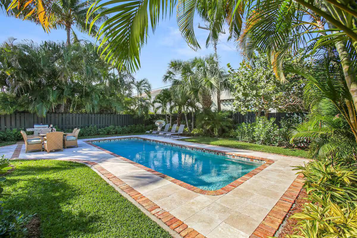 Welcome to 221 Lakeland Drive, a timeless 1928 Mediterranean gem nestled in West Palm Beach's historic Central Park district.