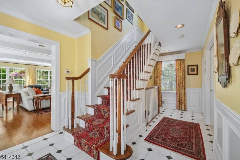 Exceptional quality and workmanship is evident throughout this beautifully renovated center hall Colonial.