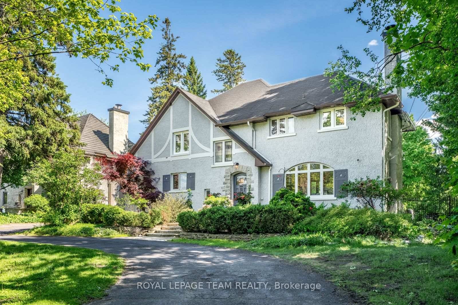 A hidden garden estate in iconic Rockcliffe Park a timeless 17, 986 sqft property steeped in beauty, privacy, and character.