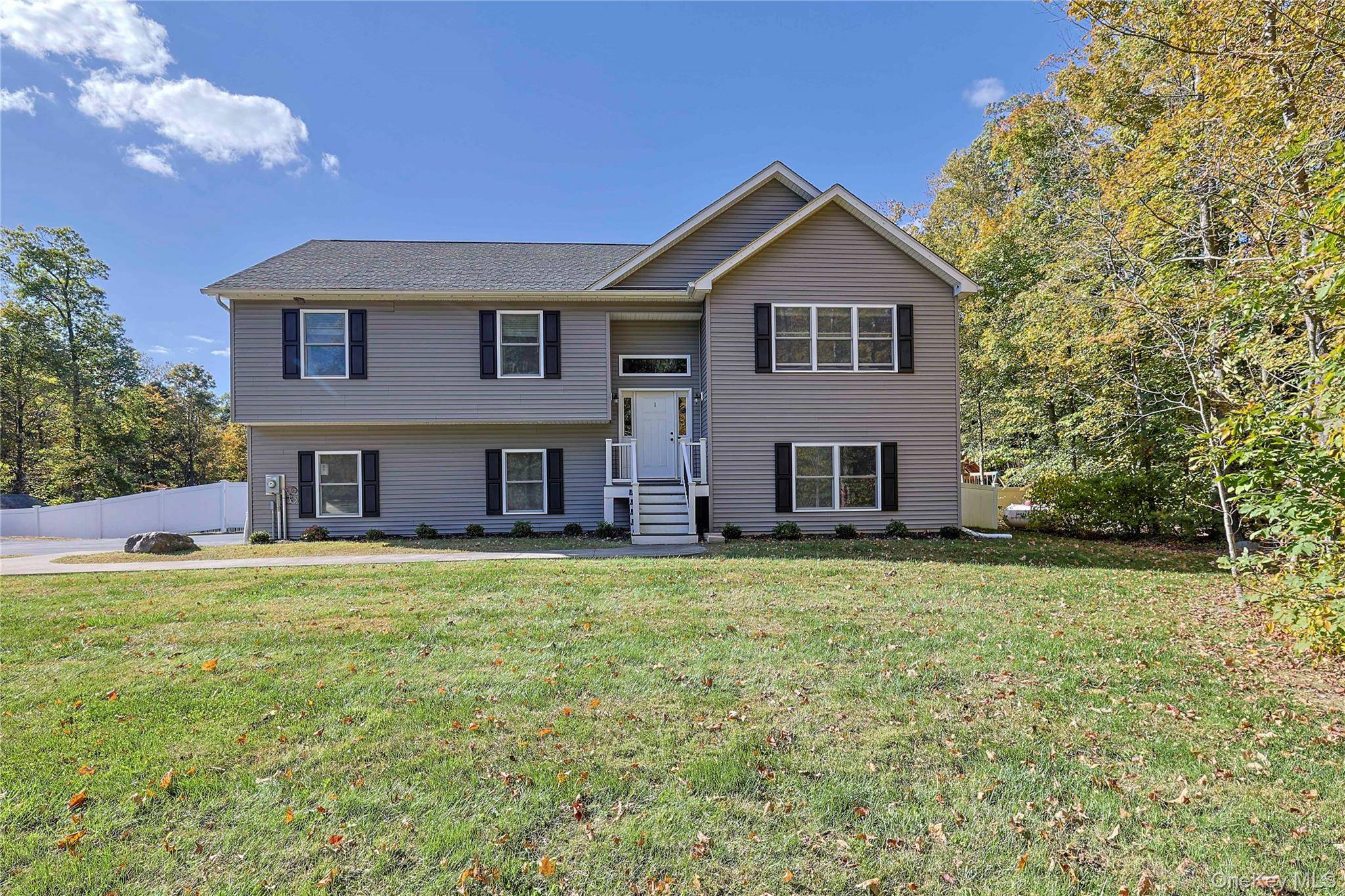 Welcome to 2255 State Route 300 an exceptional move in ready raised ranch sitting on 2 acres nestled within the highly regarded Wallkill School District.