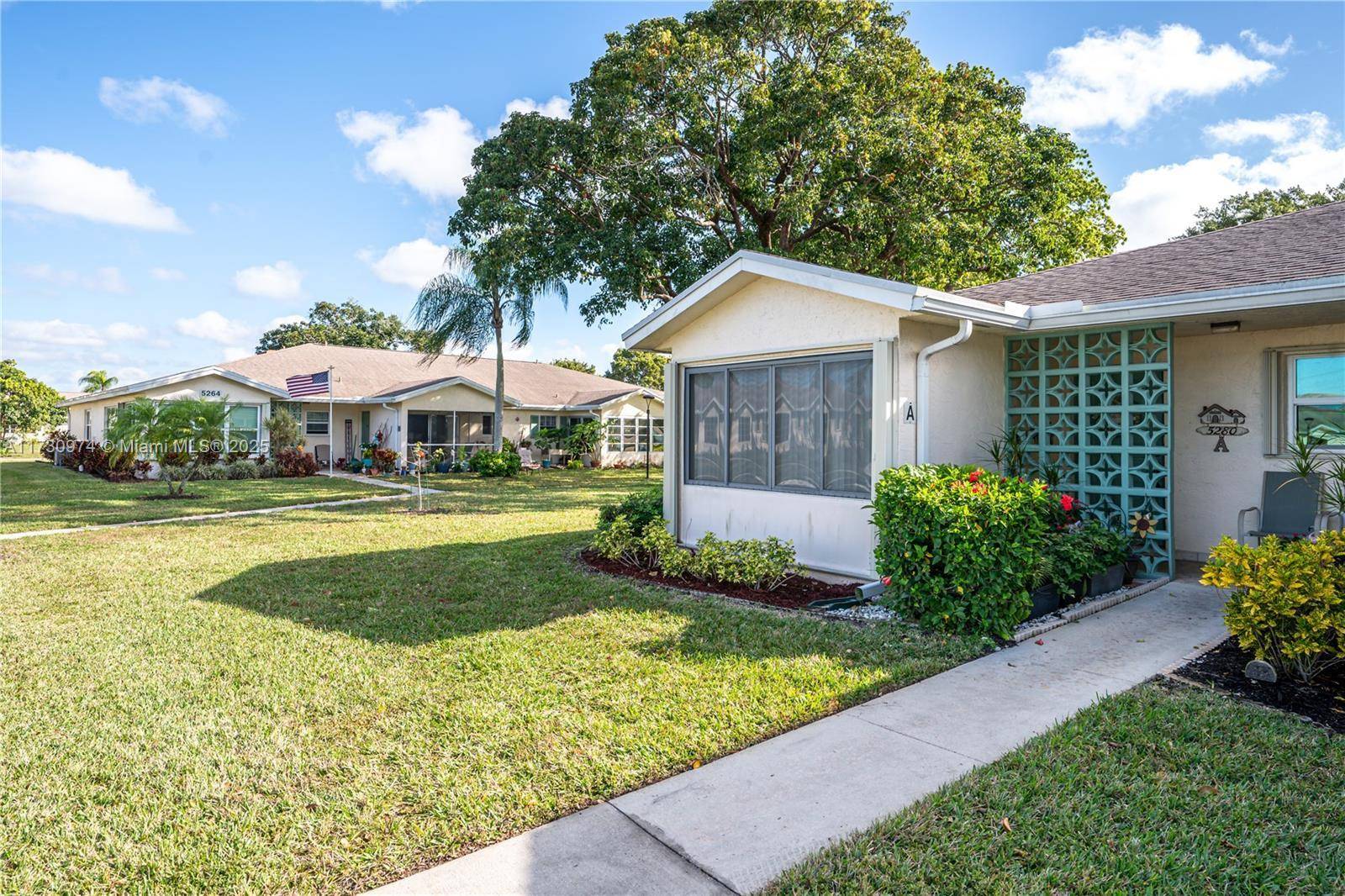 Welcome to this charming 2 bedroom, 2 bath corner villa located in a vibrant 55 community !