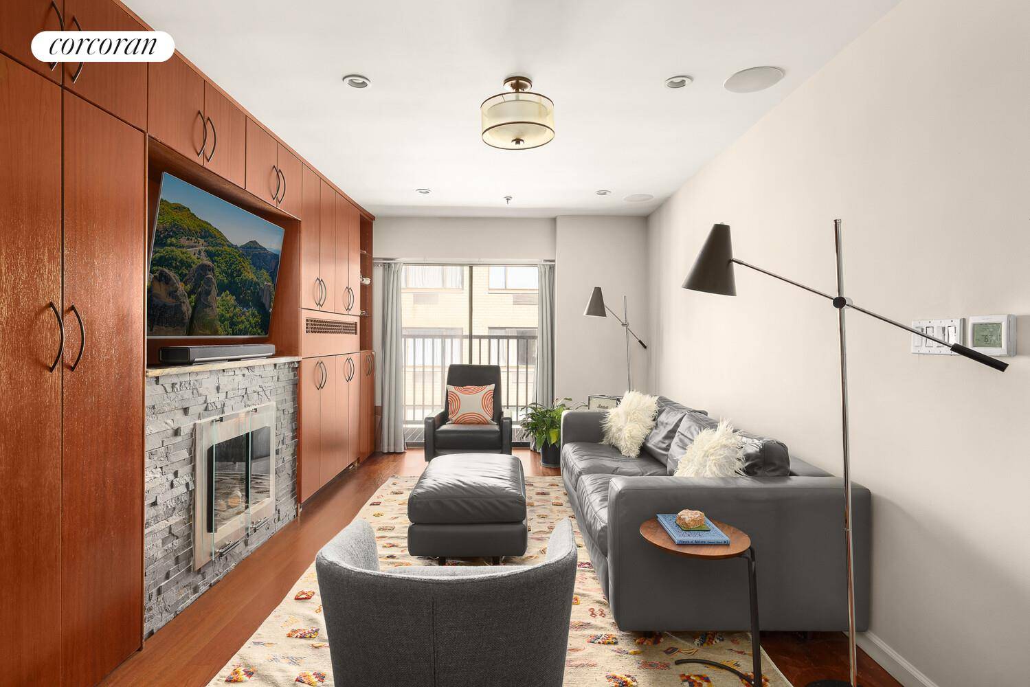 Located on the penthouse level of the historic Cast Iron Building, this bright two bedroom duplex features a large private terrace and a flexible layout.