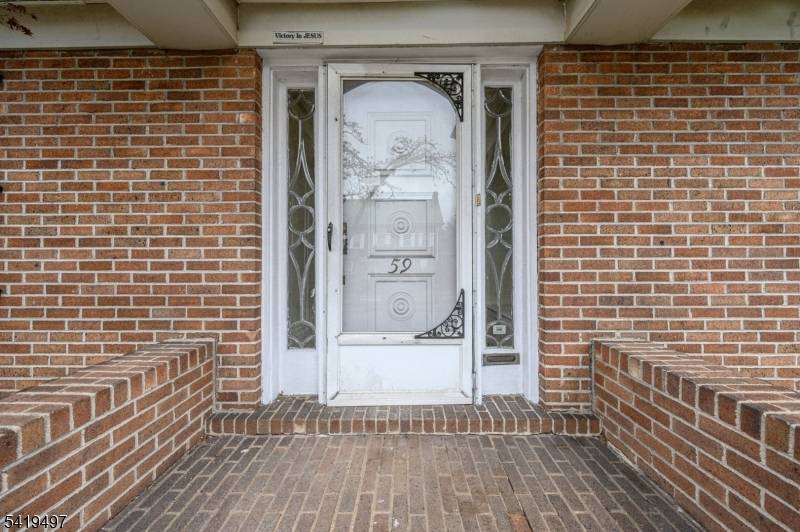 Spacious 5 Bed 3 Bath Colonial with Partial Finished Basement and Detached 2 Car Garage in the historic Pomona section is bursting with possibilities !