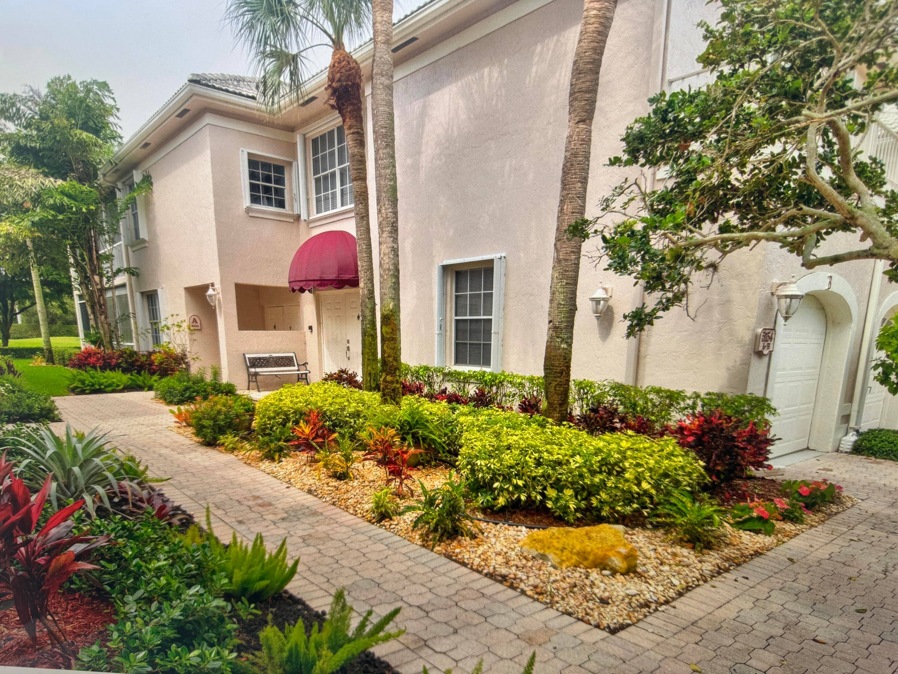 SELLERS ARE MOTIVATED ! Updated bright and light first floor condo with lake and golf course views featuring 2 bedrooms plus a den, 2 bathrooms, a wrap around screen enclosed ...