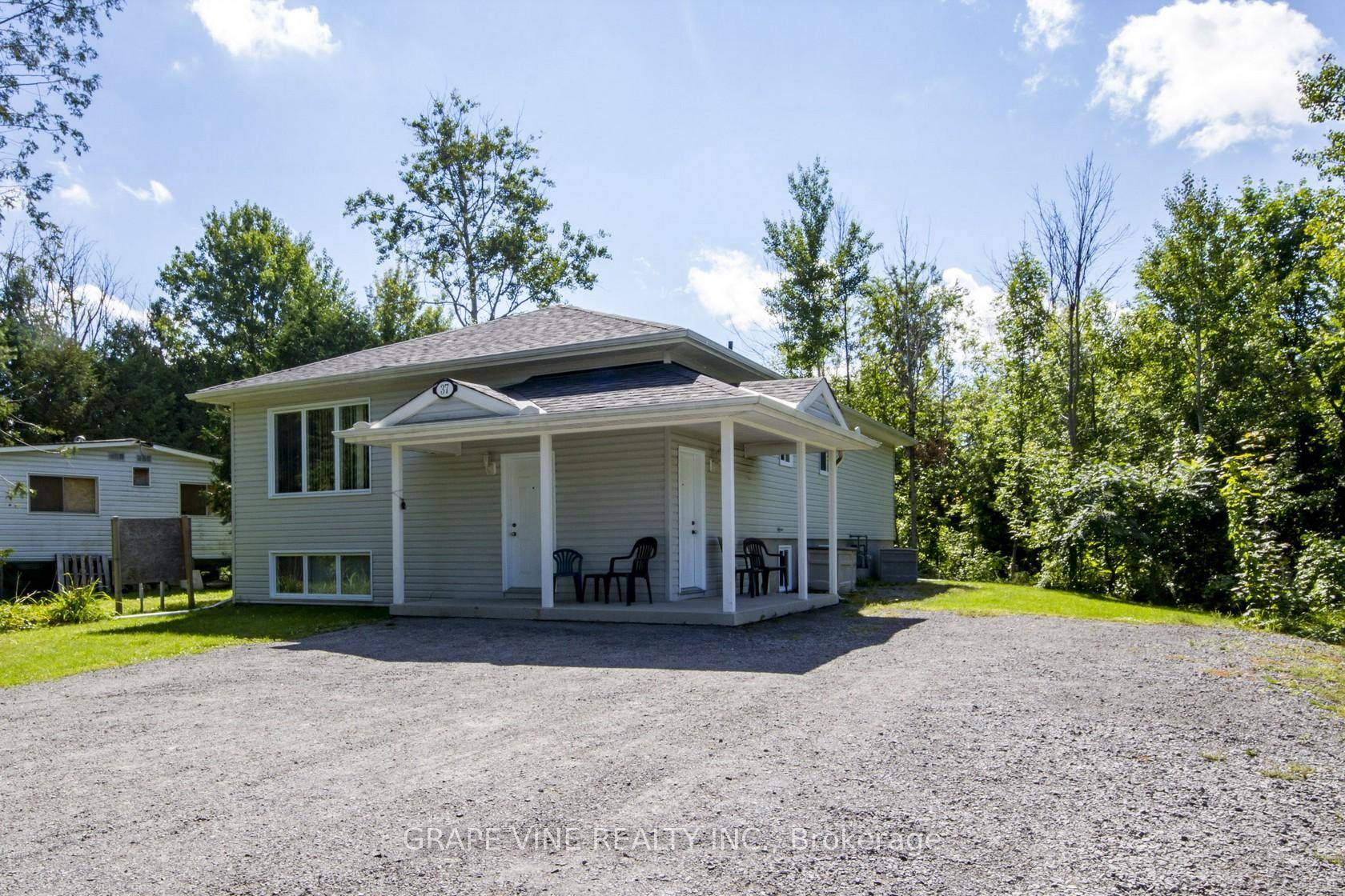 Welcome to a Raised Bungalow with a legal and professionally built Secondary Dwelling Unit SDU.
