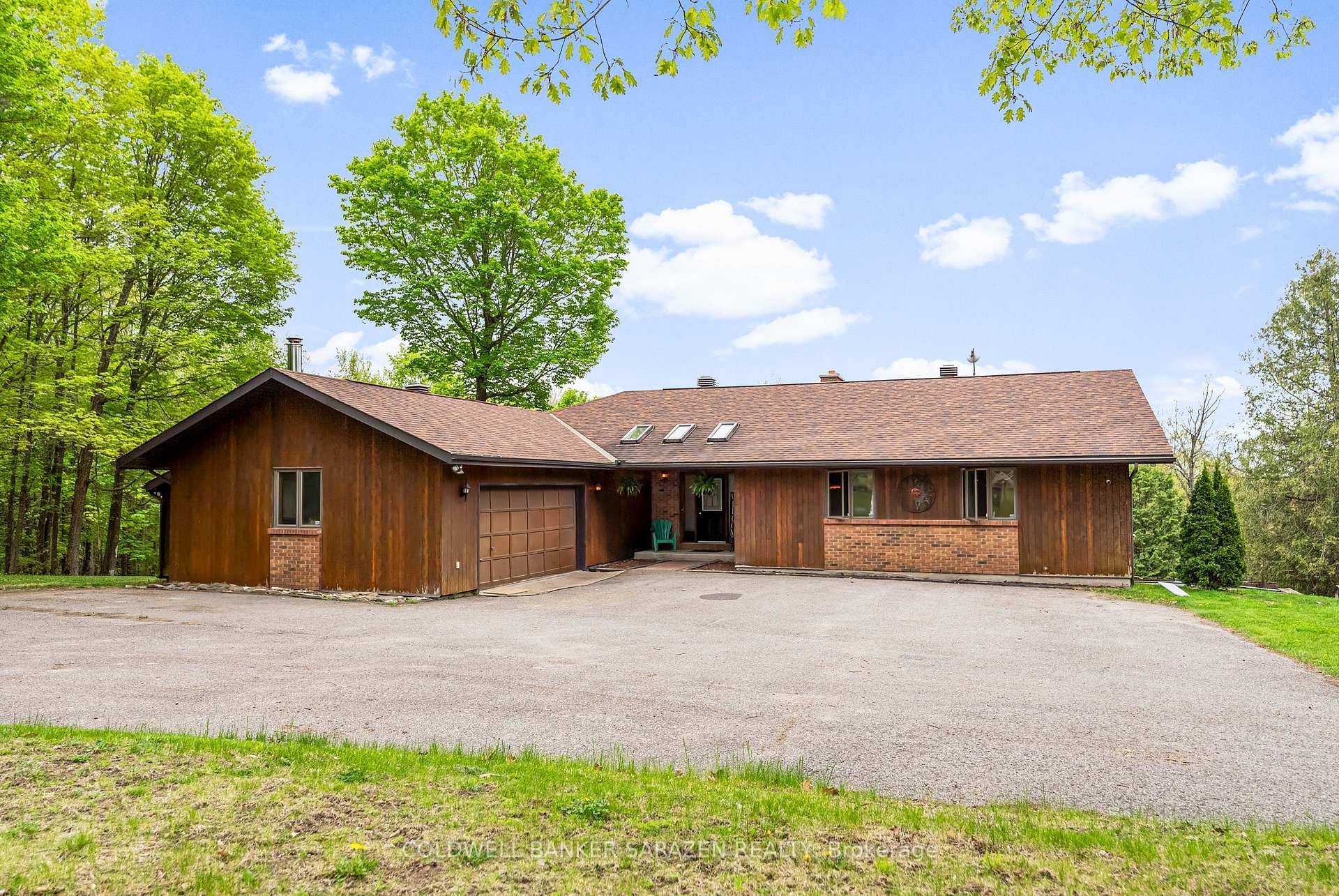 Attractive 4 bedroom, 3 bath, bungalow, featuring a walkout lower level on 12.