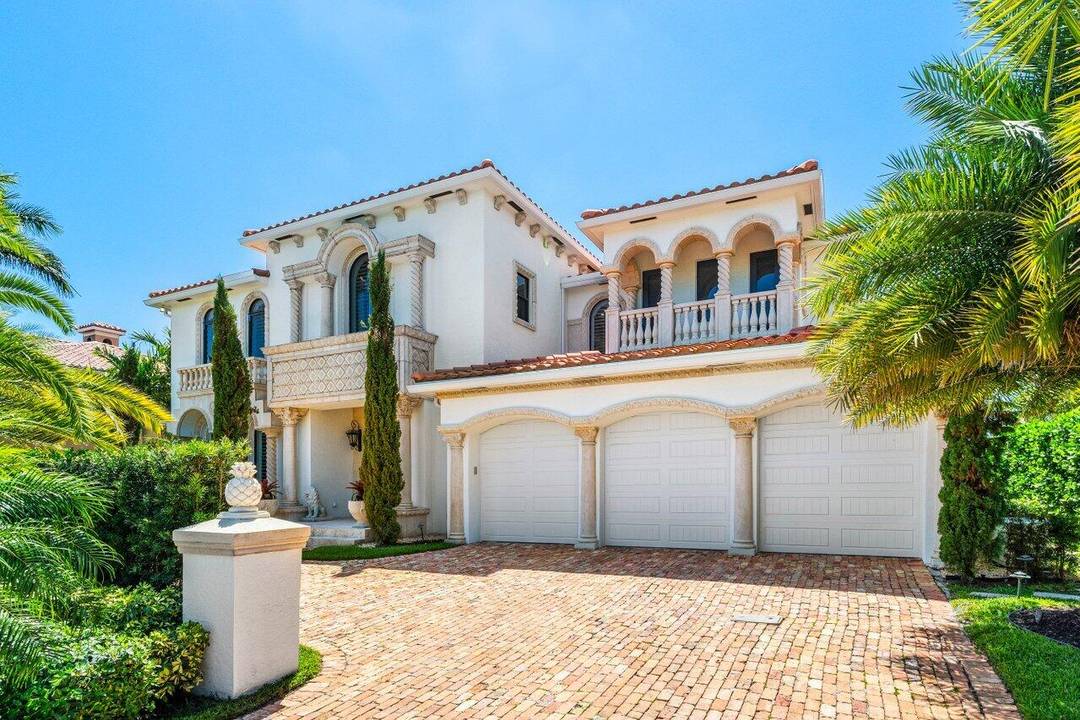 Set along the scenic Intracoastal Waterway, this stunning 4 bedroom, 5.