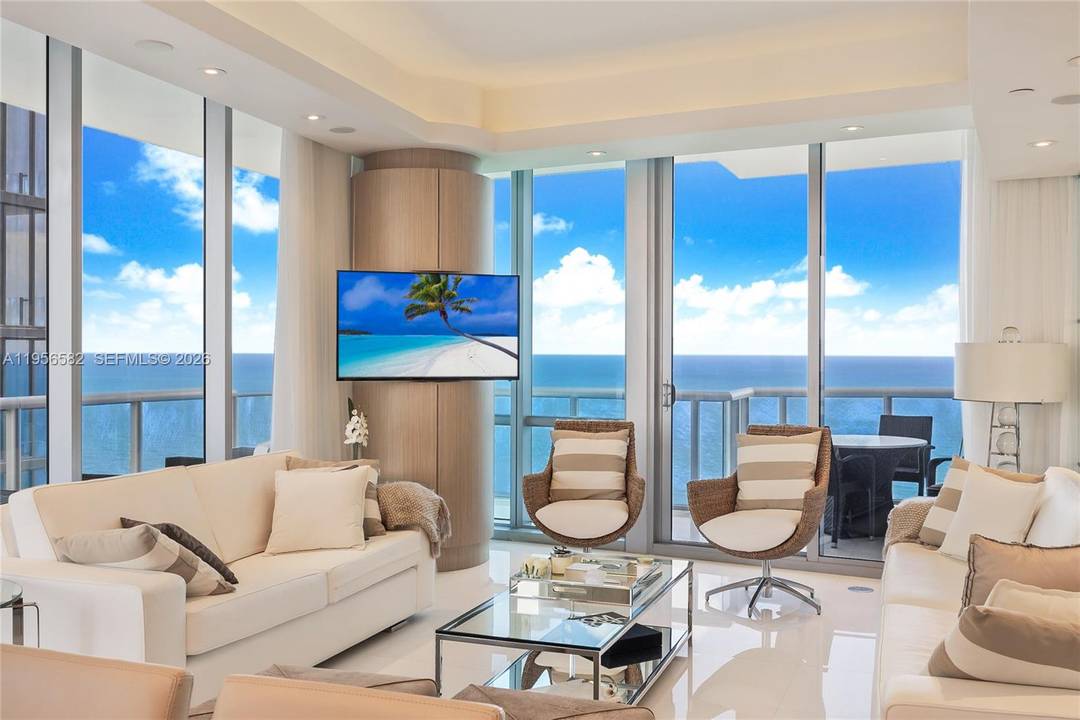 Stunning corner residence at Jade Ocean, the iconic Sunny Isles Beach tower designed by renowned architect Carlos Ott.