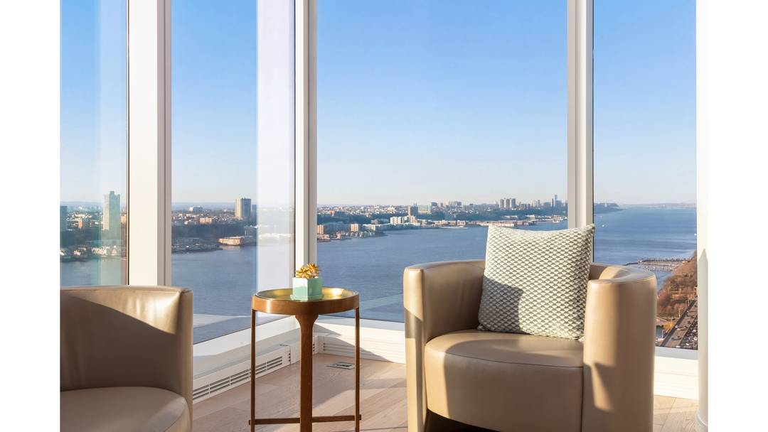 Capturing sweeping views of the Hudson River to the west and the George Washington Bridge to the north, this exceptional four bedroom, four and a half bathroom residence at Two ...