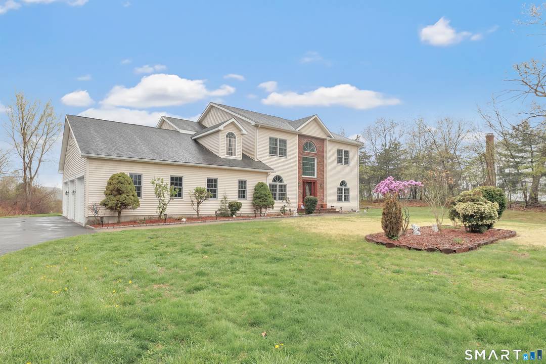 Welcome to 35 1 Punkup Road, a well maintained, custom built Center Hall Colonial on a quiet street in Oxford CT.