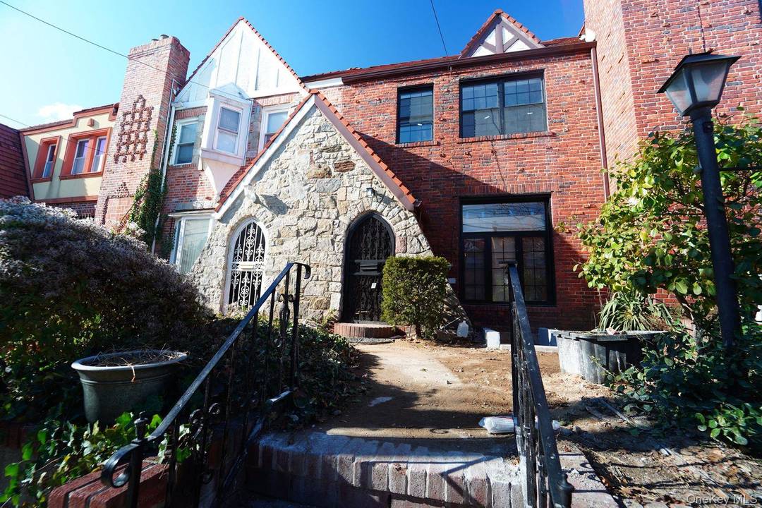Beautiful original attached English Tudor in the heart of Laurelton.