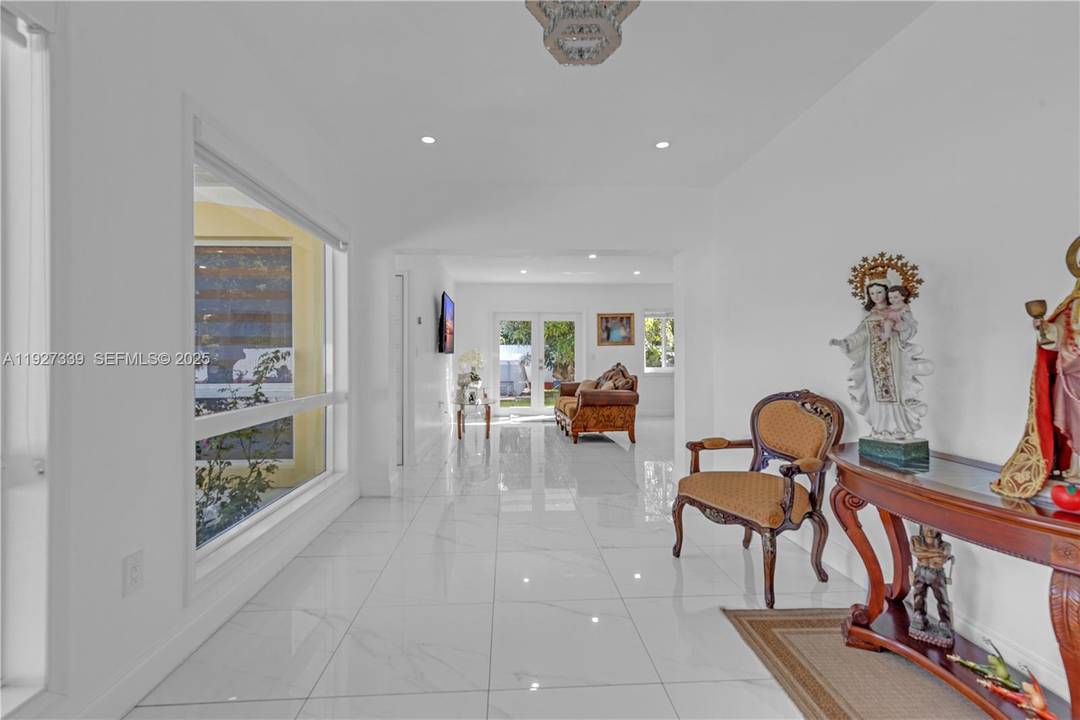 Discover this exceptional 5 bedroom, 5 bath estate located in highly desirable South Dade.