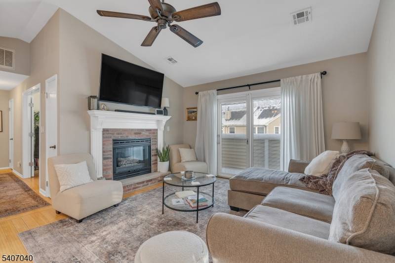 Beautifully upgraded 2 bedroom, 1 bath end unit condo in desirable Wood Duck Pond section of the Hills.