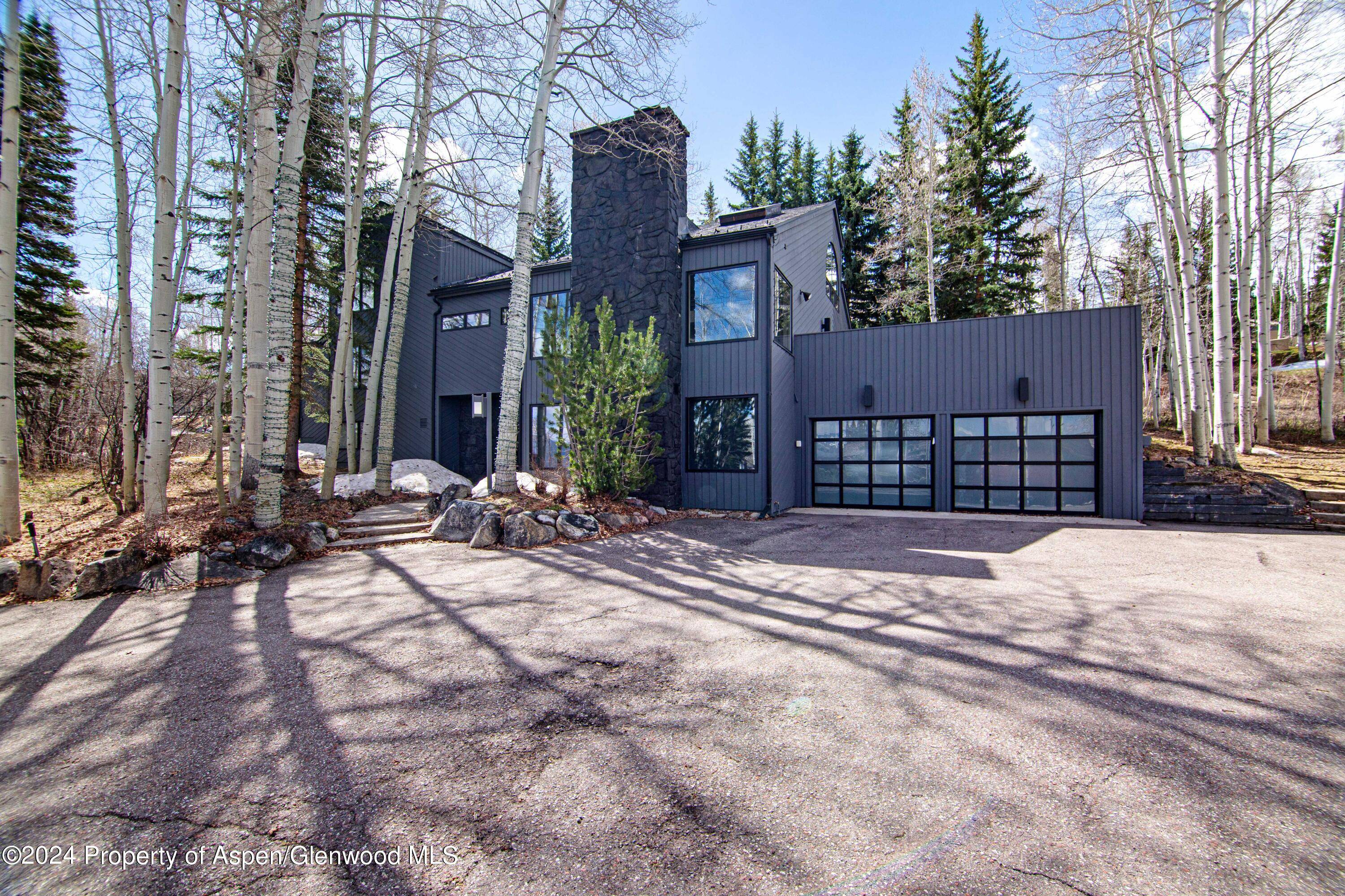 This beautifully renovated mountain home is situated on a large lot in one of Snowmass Village's most sought after neighborhoods of Ridge Run.