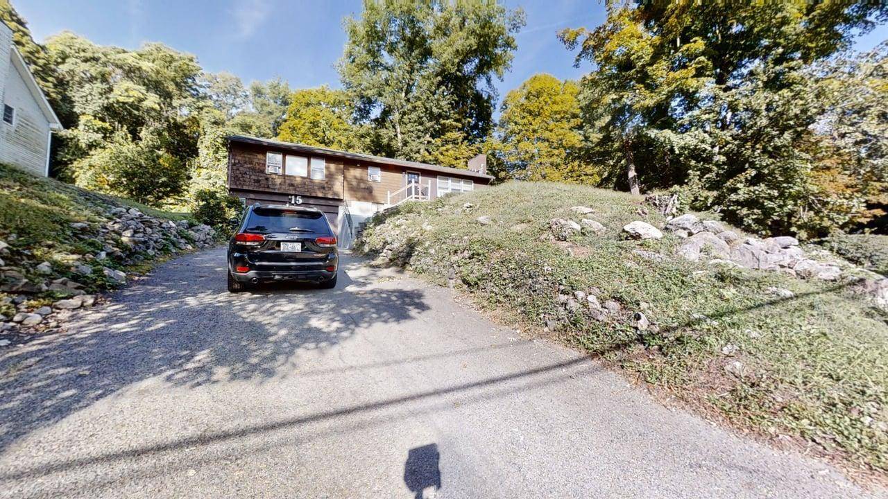 This Raised range was totally renovated in 2019 with all new appliances, boiler, bathrooms, Northwest Red oak floors, solid cement staircase, fresh landscaping.