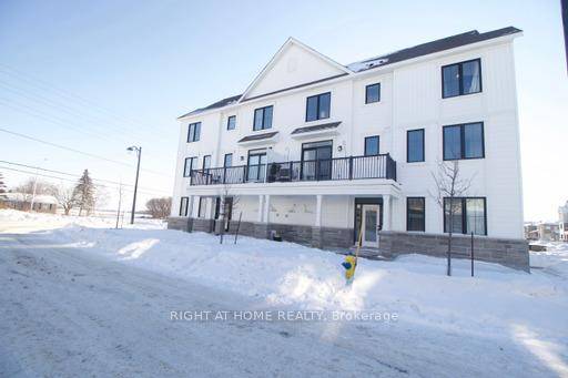 This beautiful home boasts of 3 bedrooms, a main floor den, 2.
