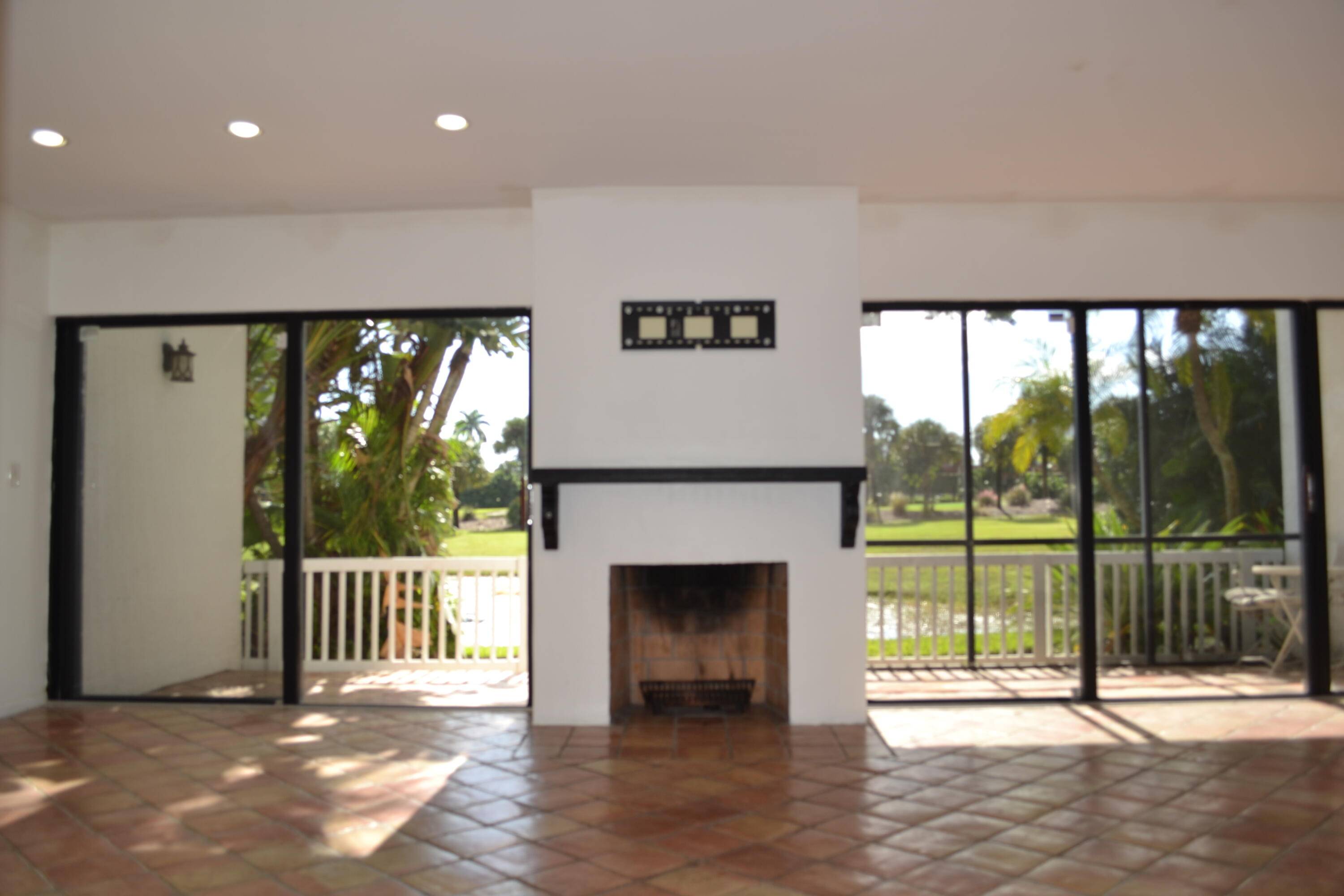 Charming 2 bedroom, 2 bathroom Villa, covered parking for 2, kitchen boast granite countertops stainless steel appliances, Wood burning fireplace, second floor den could be 3rd bedroom, 2 screened lanai's ...