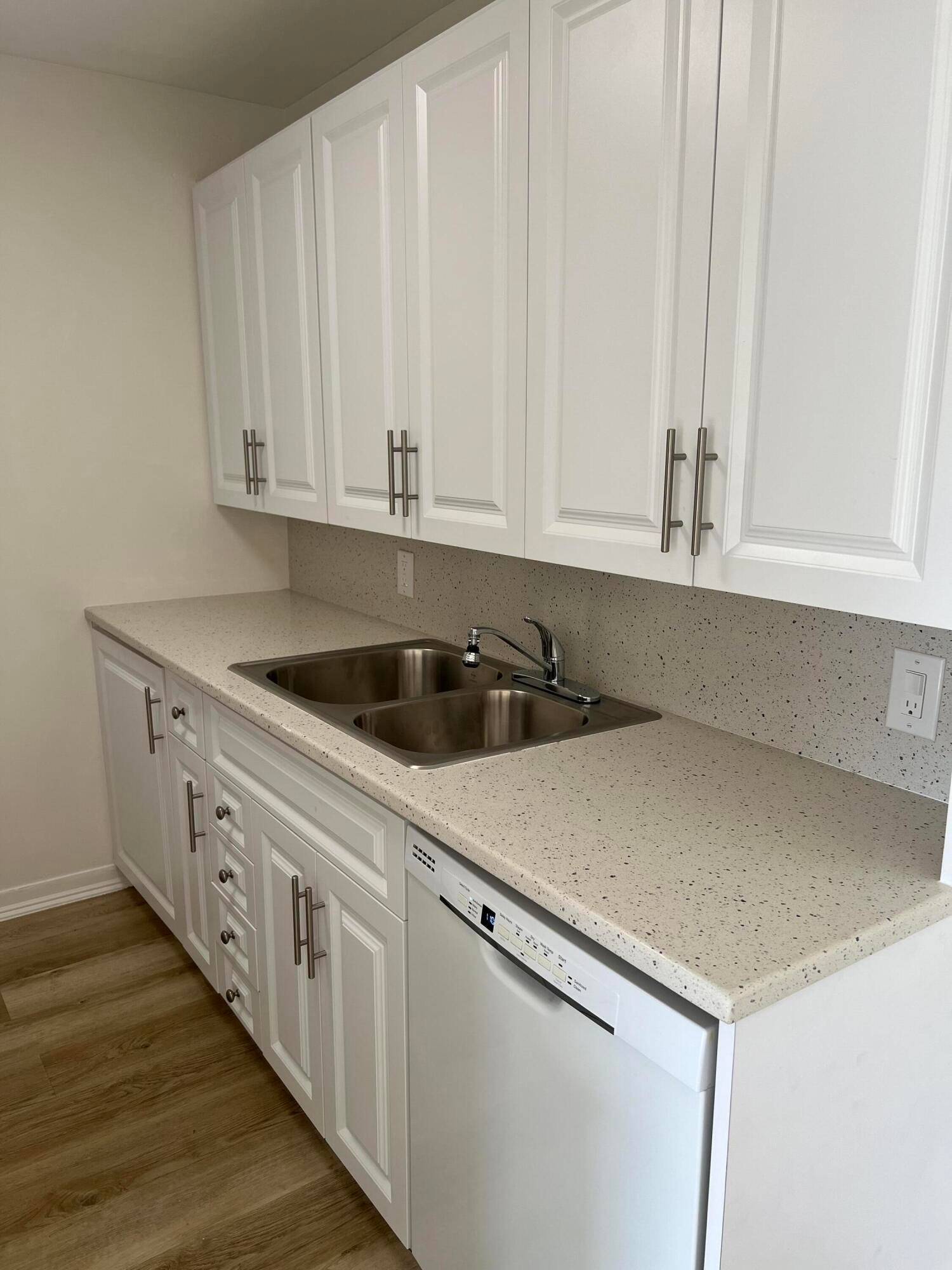 BEAUTIFULLY UPDATED CONDO IN A FOUR STORY BUILDING WITH ALL THE CONVINCES.