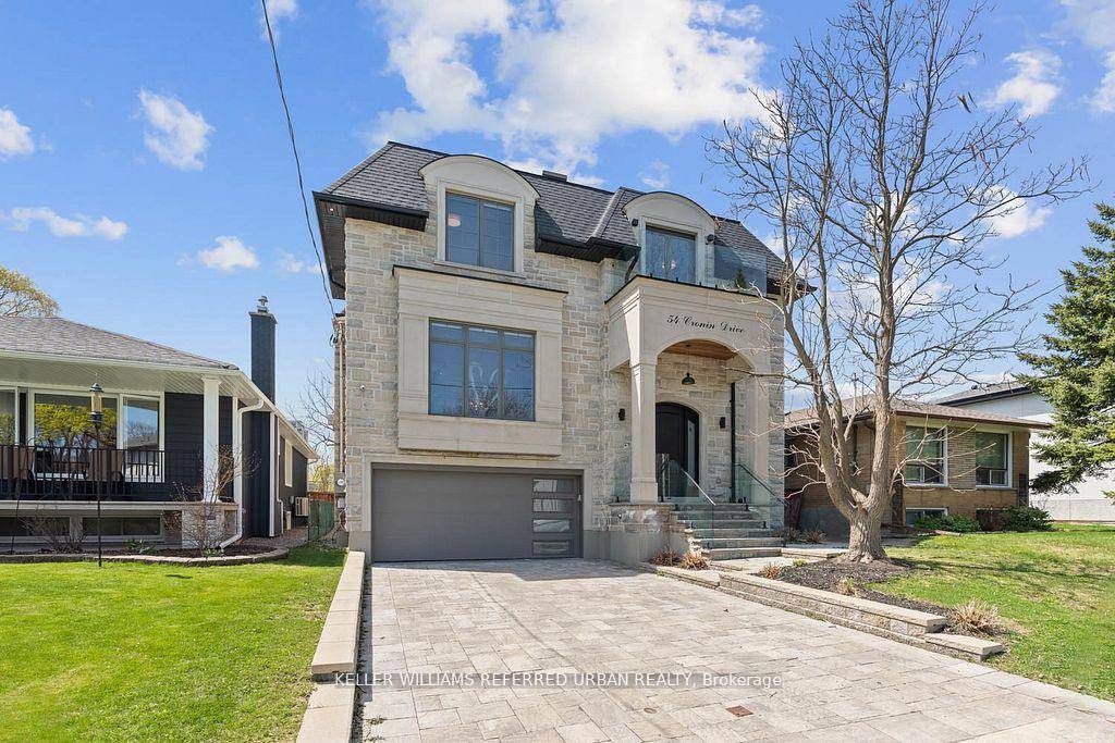 A stunning fusion of form and function, this custom built residence showcases a design forward aesthetic with impeccable craftsmanship throughout.