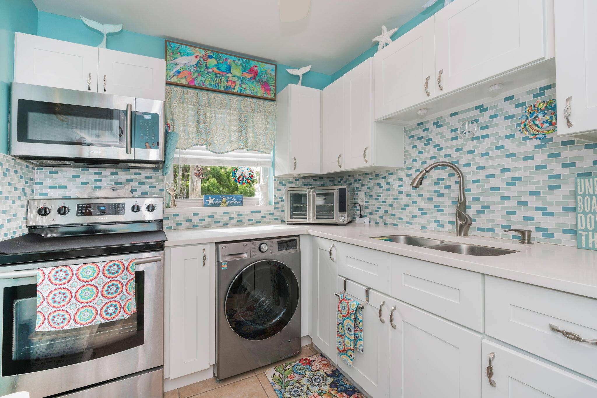 Enjoy the coastal breezes from this bright 2nd floor corner unit condo in the heart of downtown Lake Worth Beach.