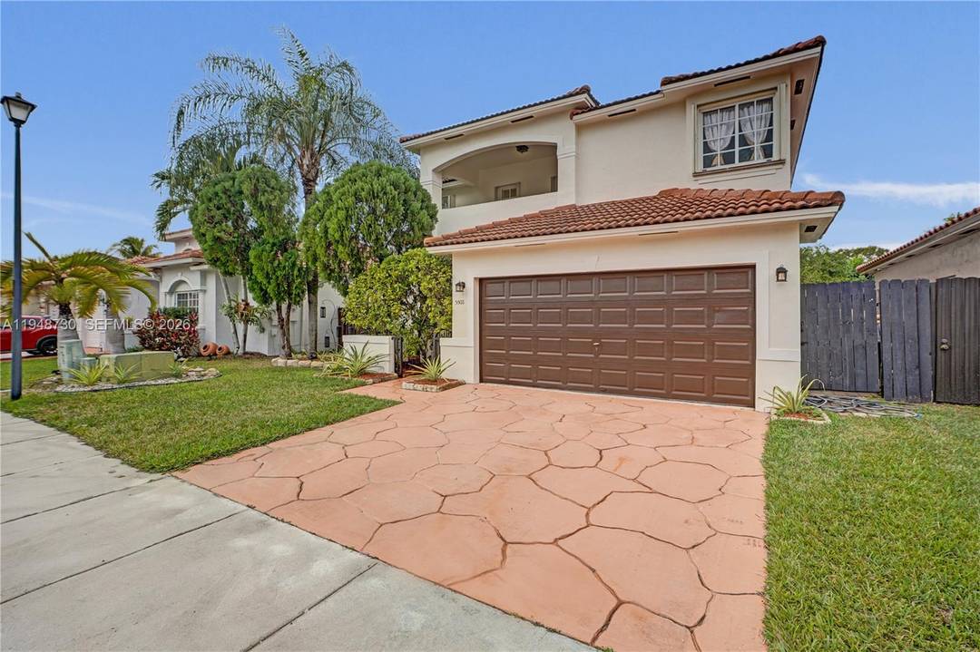 Freshly painted two story home located in the Pelican Cove community of West Kendall.