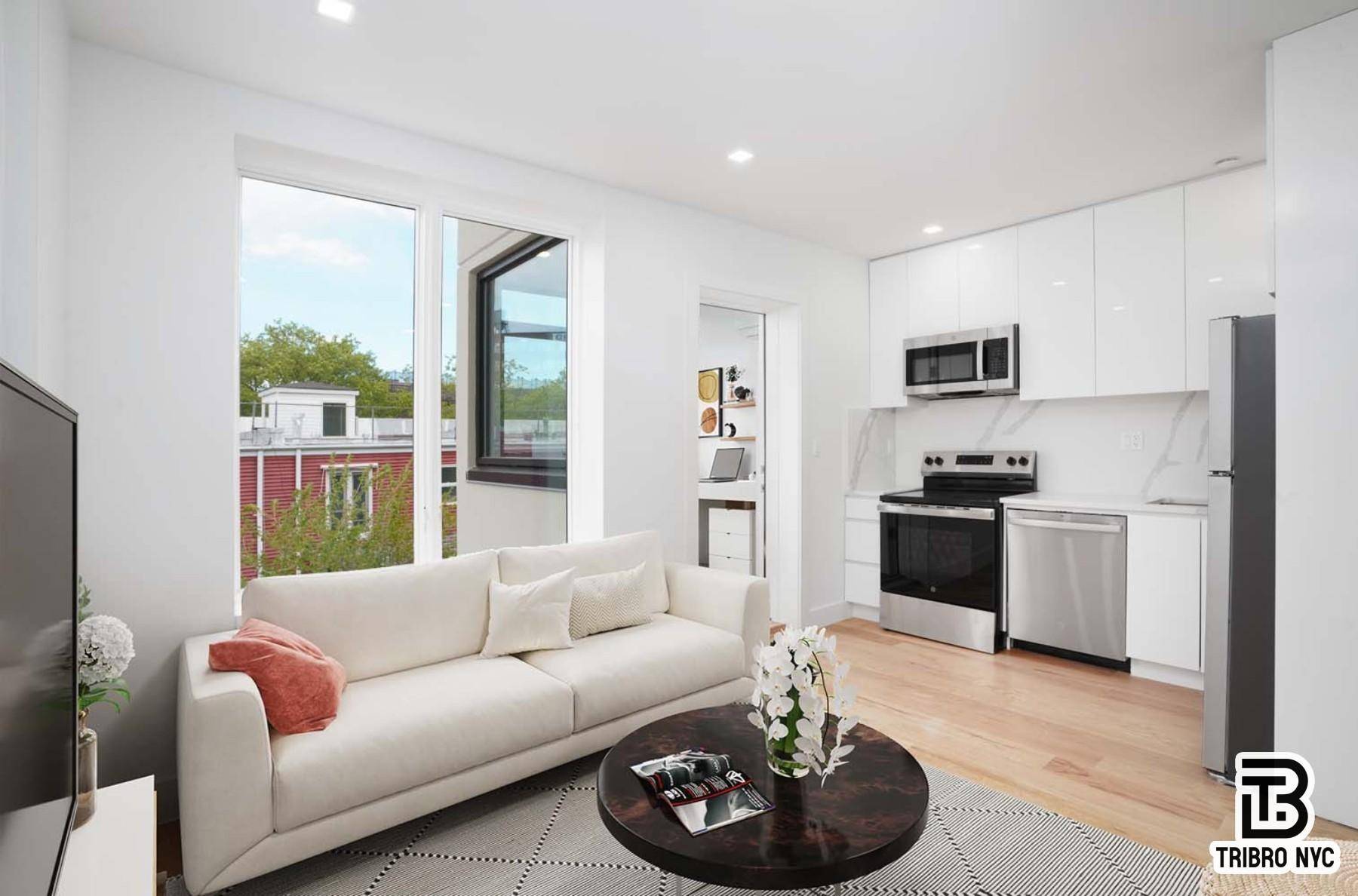 Bright 2 bed 2 bath with office with laundry in the unit.