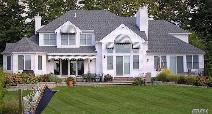 Enjoy amazing sunsets from your back yard over looking Aspatuck Creek.