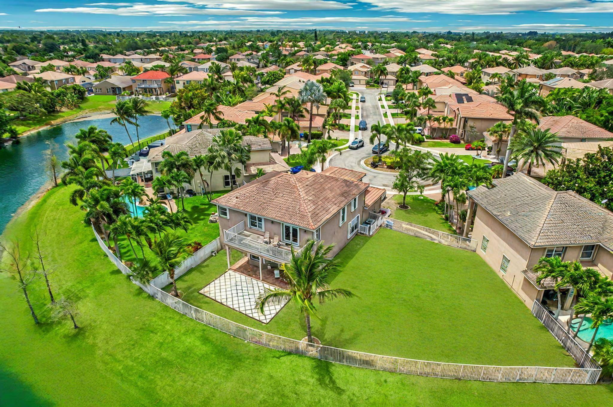 Welcome Home to this Stunning 6 Bedroom, 4 Bath Home on an Extra Large Cul de Sac 1 4 acre Lot with Breathtaking Lake Views.