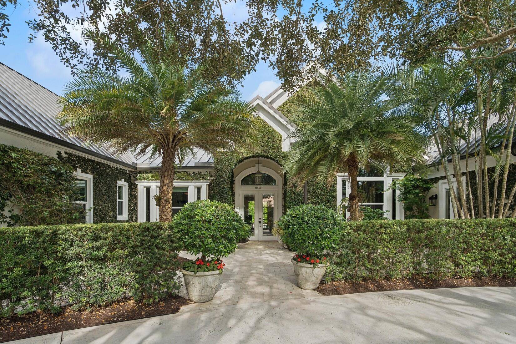 Welcome home to this fabulous renovated home in the quaint community of Quail Ridge in Hobe Sound !