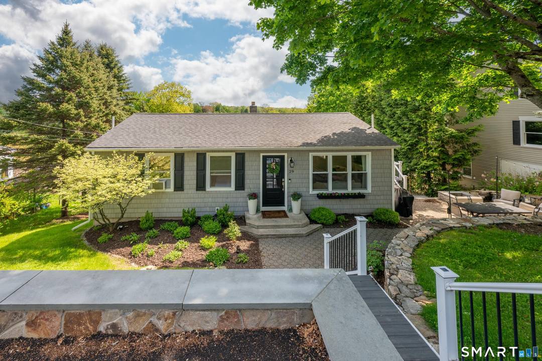 This charming home in the popular Candlewood Shores offers a bright and updated interior with a modern aesthetic.