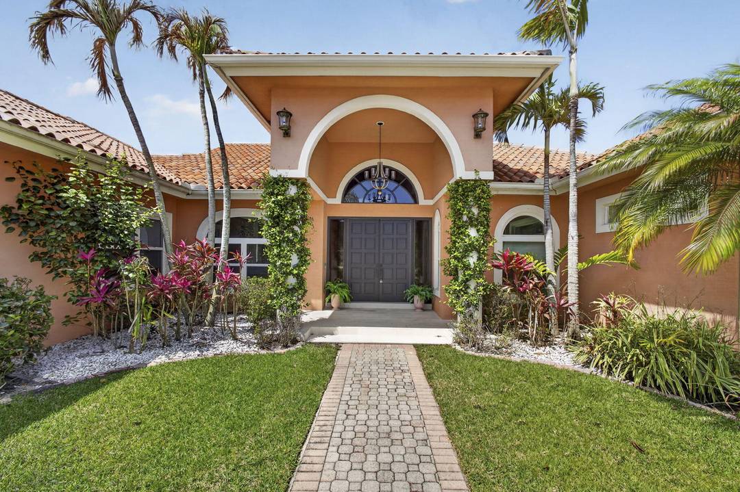 Located in the gated, community of Mystic Cove,, just off Gomez and a mile from one of the most beautiful beaches in Florida.