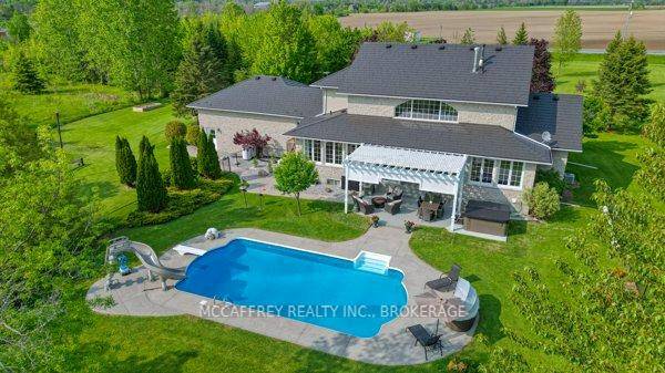 Discover an exquisite stone estate nestled on 18 picturesque acres located just minutes from downtown Napanee.