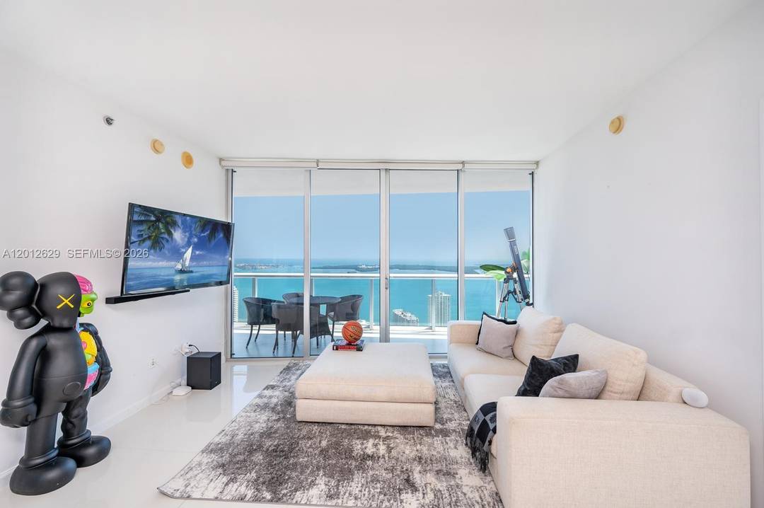 Stunning high floor residence at Icon Brickell Tower I on the 53rd floor with breathtaking, unobstructed views of Biscayne Bay, Miami Beach, Star Island, and the Port of Miami.