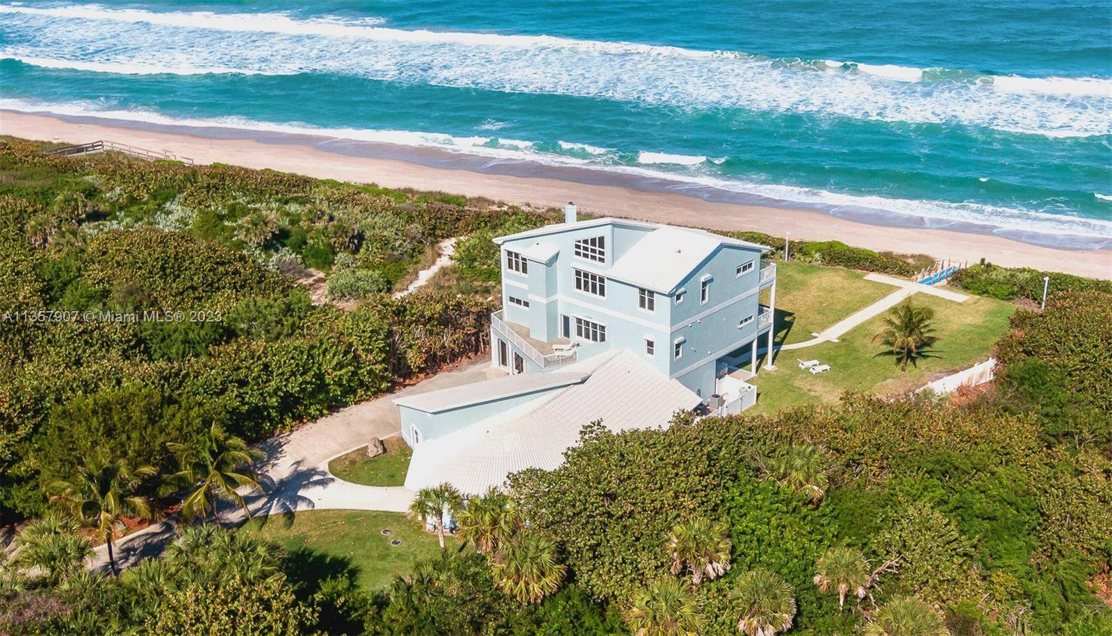 Stunning XL 3 story Beach House located on the Atlantic Ocean on 1.