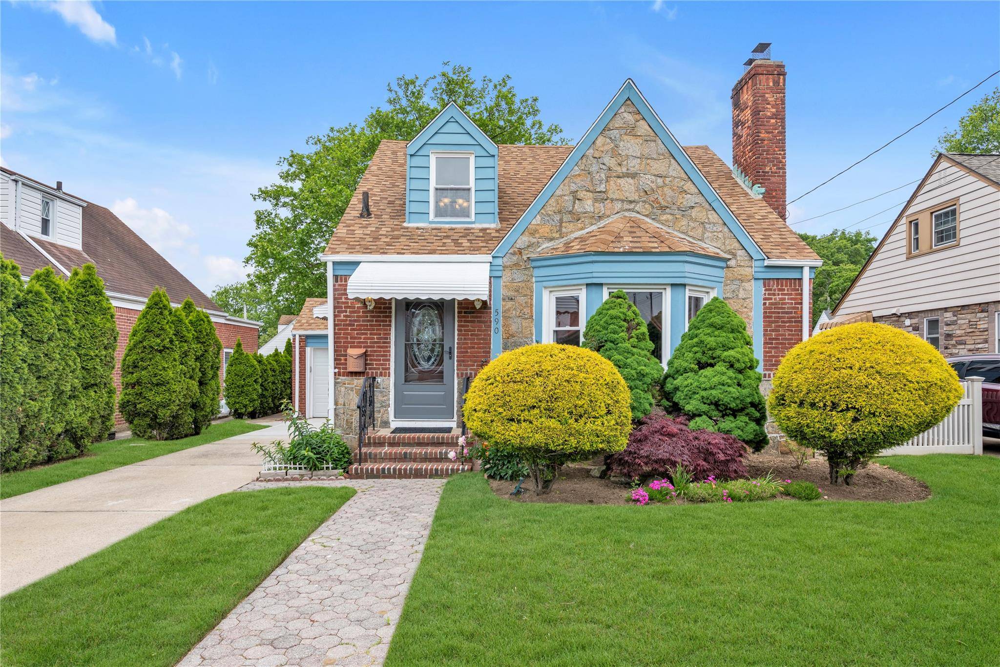 Charming Cape Cod style home built in 1940 on quiet street.