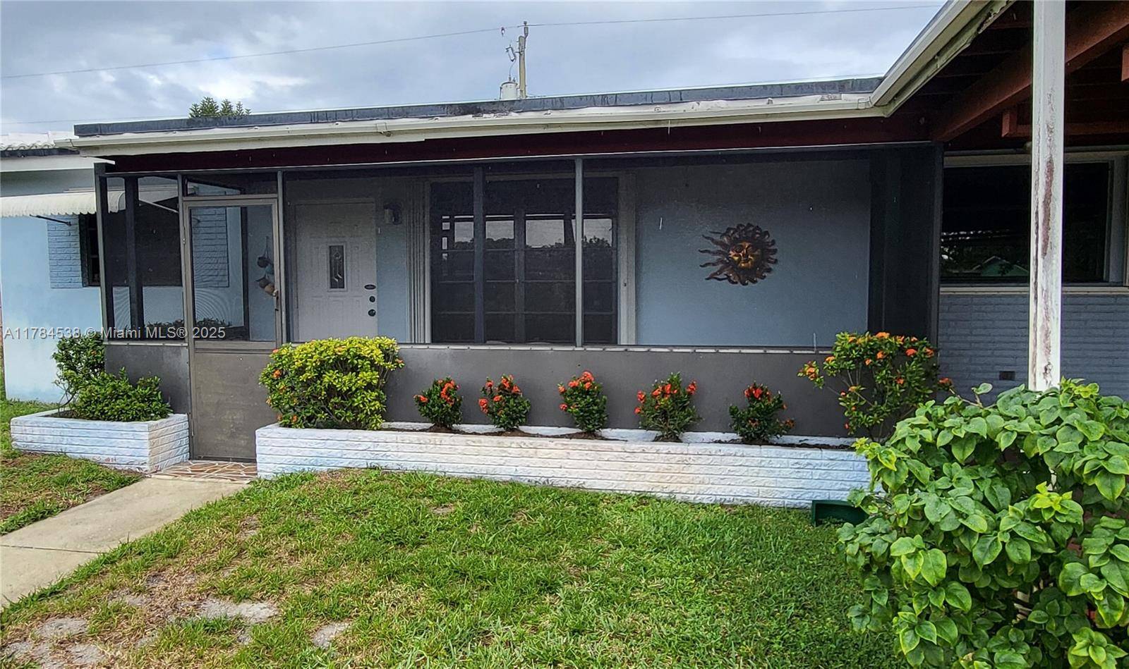 This exceptional home features three spacious bedrooms, one bathroom, and a carport.