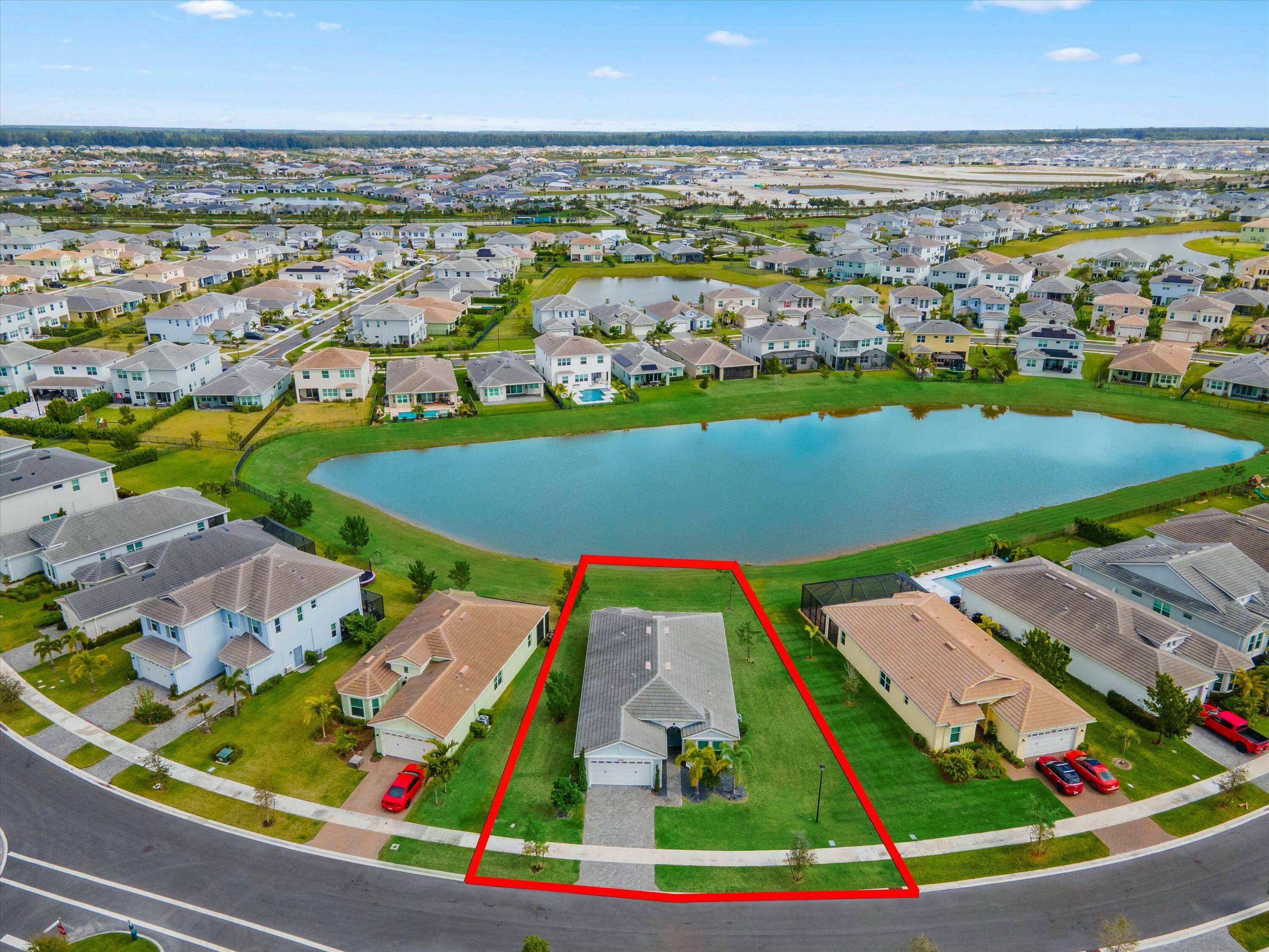 Welcome to this stunning modern gem nestled on a rare pie shaped lot in the highly desirable Groves of Westlake.