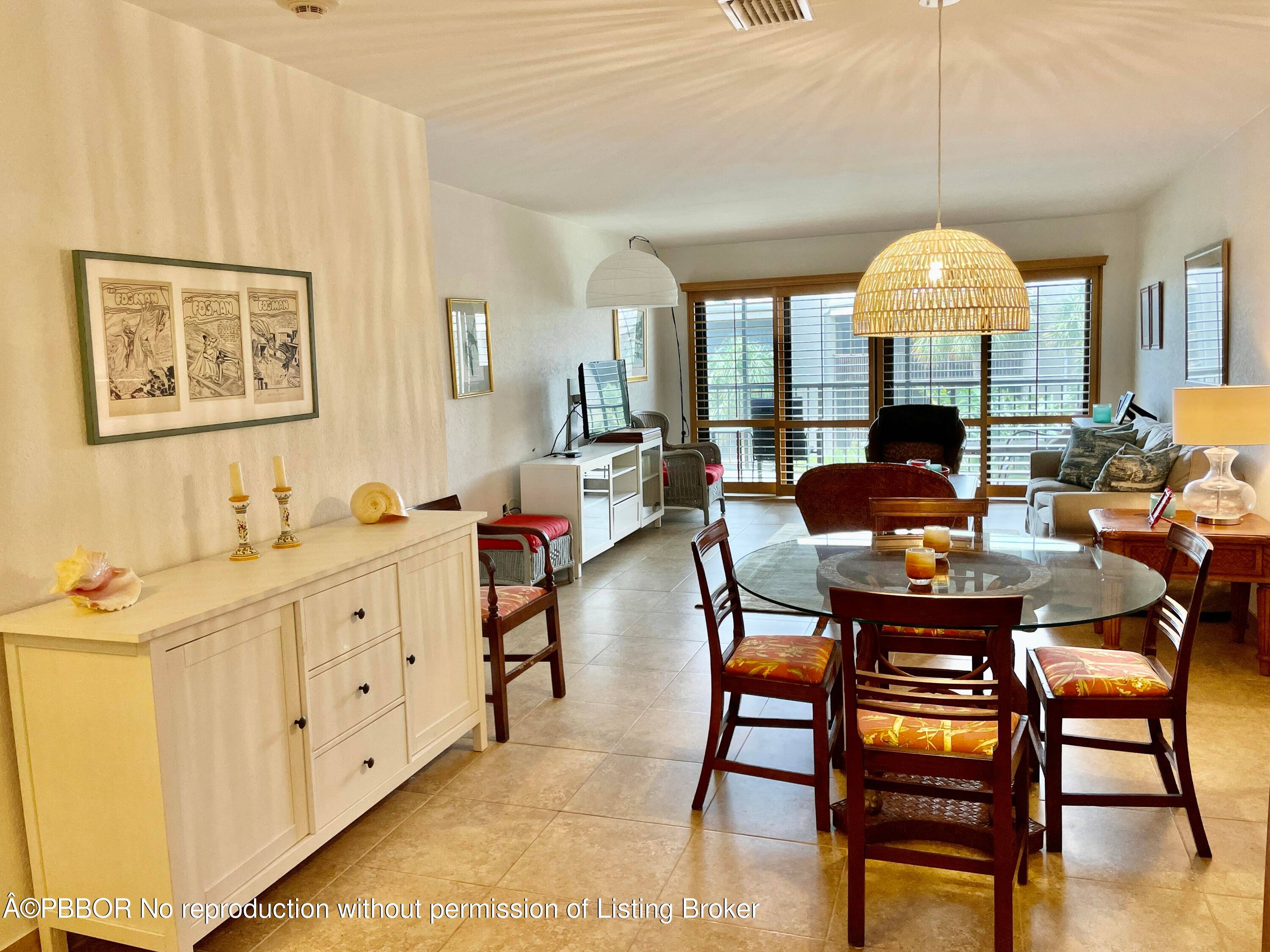 Remodeled top floor unit with views of Intracoastal, pool and lush tropical grounds.