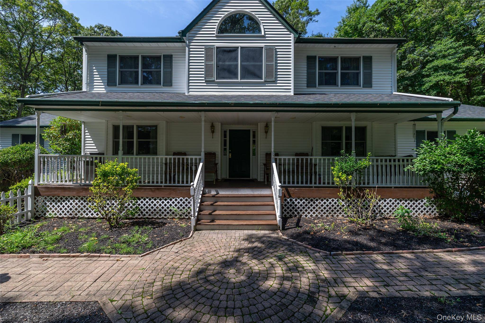 Wading River Victorian home offers a perfect blend of charm and modern amenities.