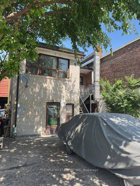 Upper level apartment featuring 1 bedroom plus a den, 1 bathroom, and 2 parking spaces.