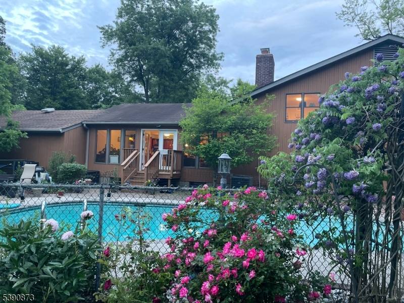 Your staycation home awaits in this custom split level home on 3.