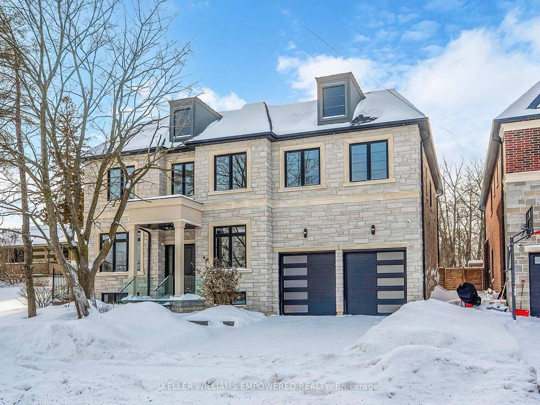 Southern facing rear grounds backing to City owned property with front yard facing toward natural pond creates scenic natural views from every angle !