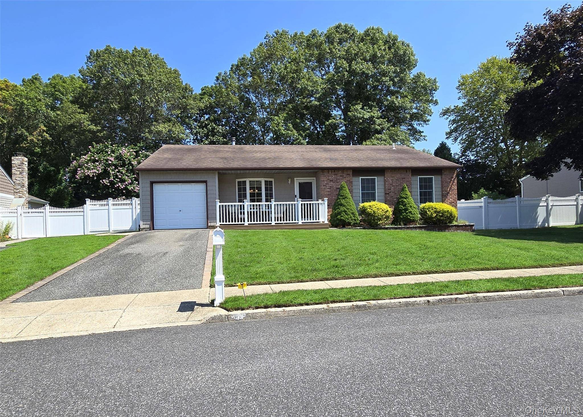 Beautiful ranch style home located in the heart of the much desired New England Village section of Holbrook.
