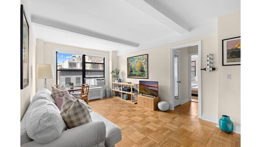 Newly renovated and filled with natural light, this south facing two bedroom, two bathroom home offers spacious, well proportioned rooms and the convenience of an in unit washer and dryer.