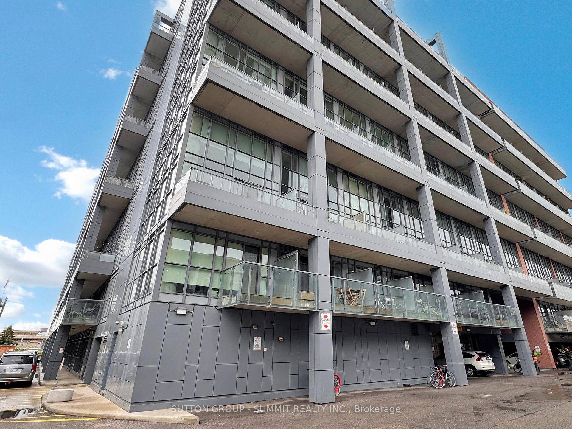 Stunning Two Storey Live Work Loft featuring soaring 17 ft ceilings and dramatic floor to ceiling windows.