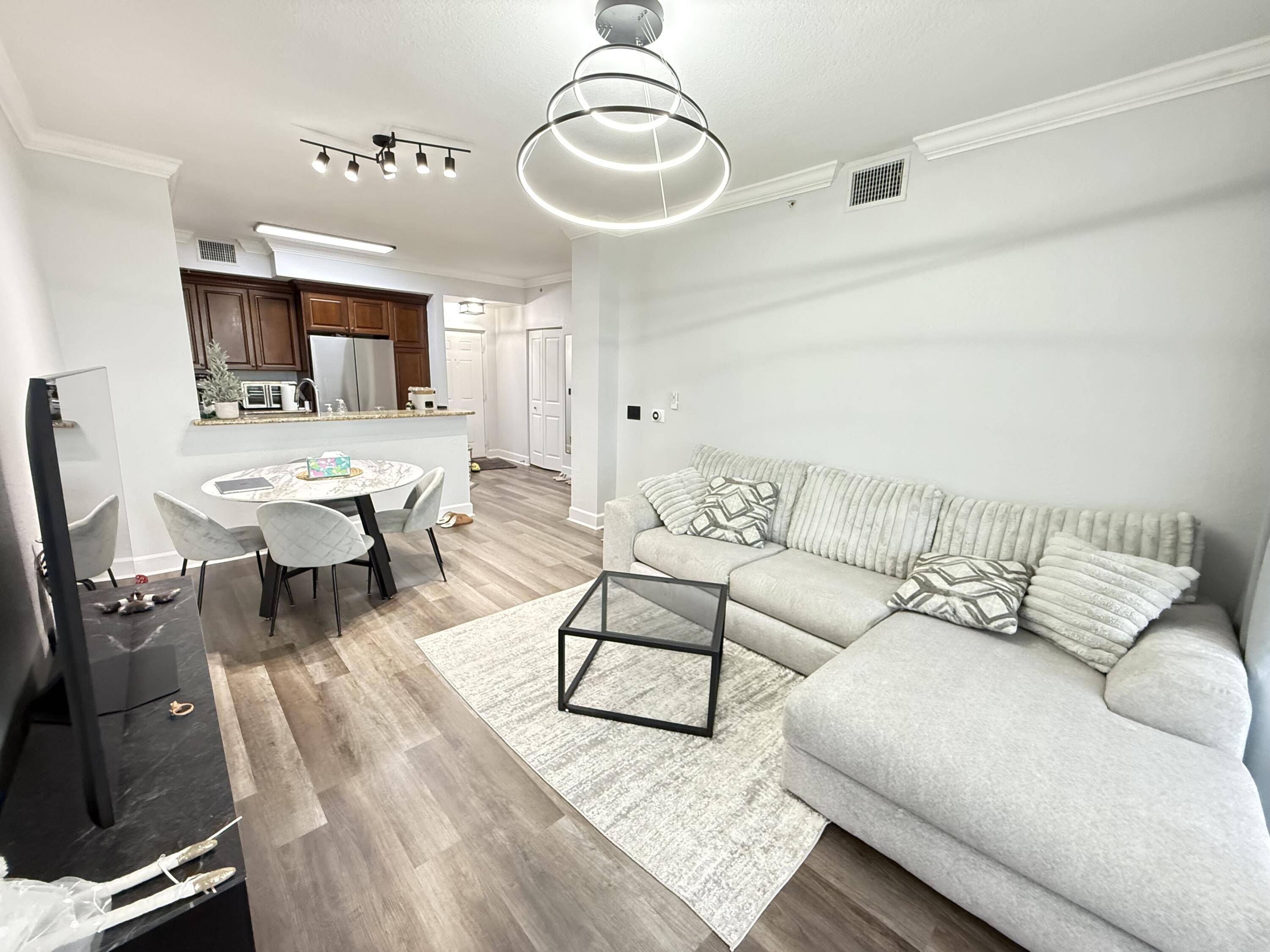 ONE OF A KIND MUST SEE TOP FLOOR CORNER APARTMENT.