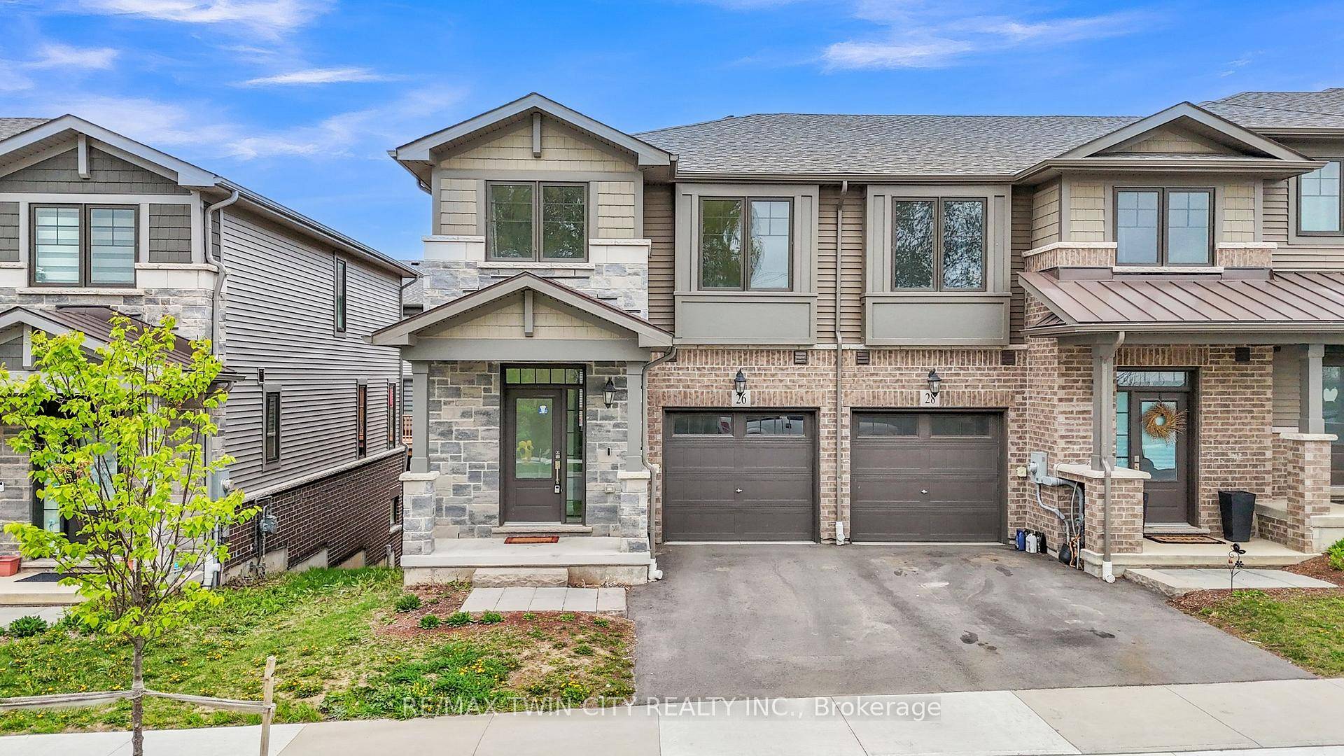 Highly upgraded freehold end unit townhome with a walk out basement, located in one of Cambridges most desirable communities.