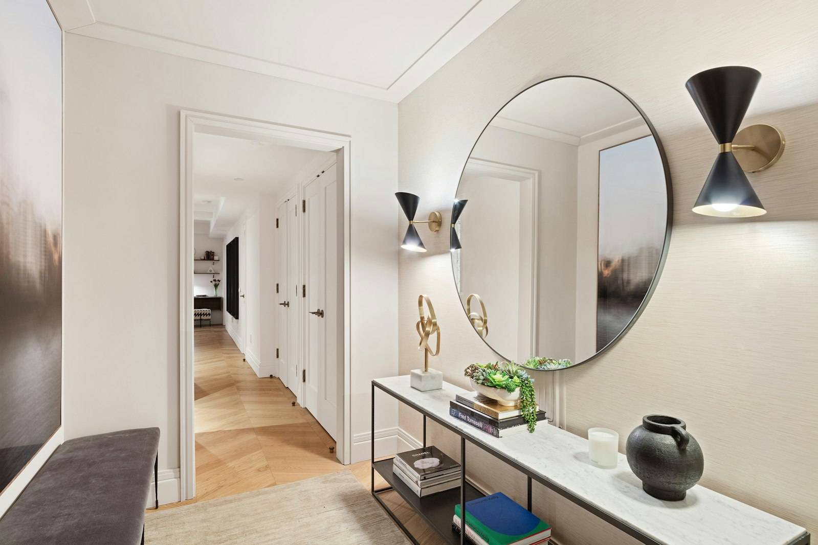 Residence 6F is a stunning one bedroom, one and a half bathroom featuring a generous foyer and expansive living dining room.
